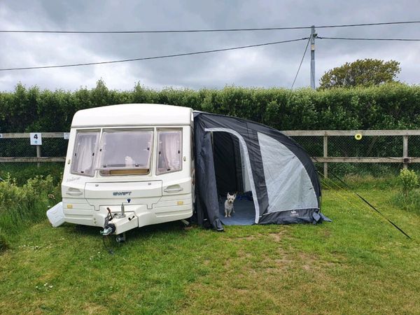 Caravan ground outlet sheet