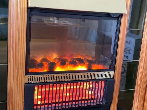 Dimplex electric fireplace with surround included for sale in Co. Kilkenny  for €10 on DoneDeal