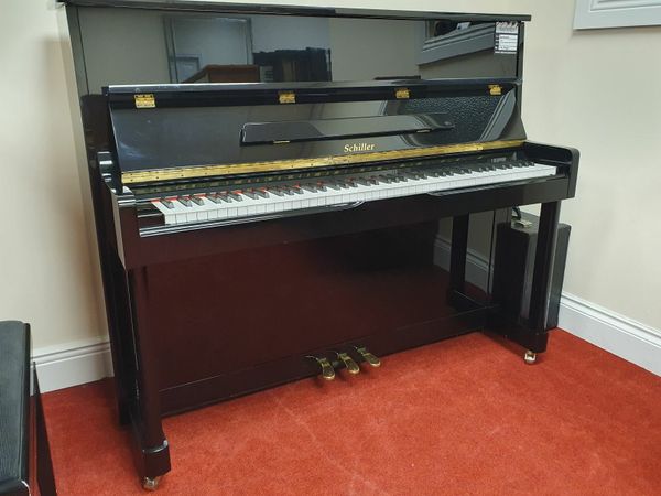 Schiller deals upright piano