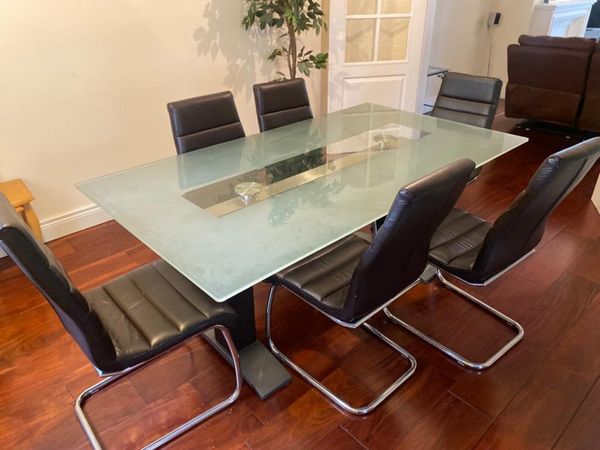 Small glass deals table with chairs