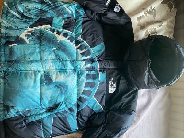 Supreme north face baltoro fake sale