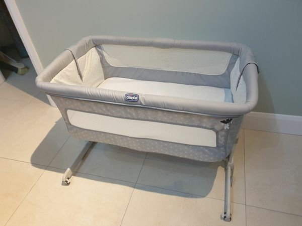 Chicco Next 2 Me baby crib with fitted sheets for sale in Co. Cork for €50  on DoneDeal