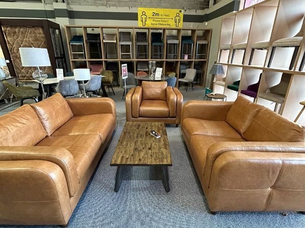 Leather sofa deals showroom