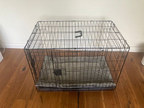 Metal dog crate shop with metal tray