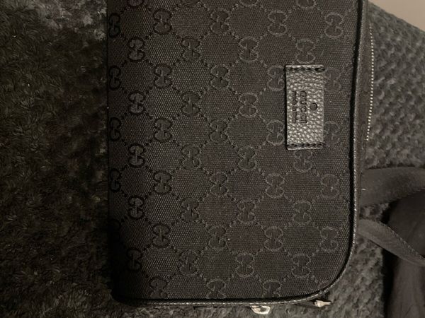 Men's gucci pouch sale hot sale