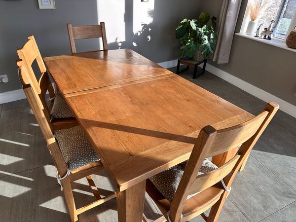 Solid oak dining room on sale table and chairs