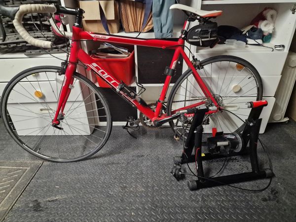 Road Bike with Trainer for sale in Co. Cork for 80 on DoneDeal