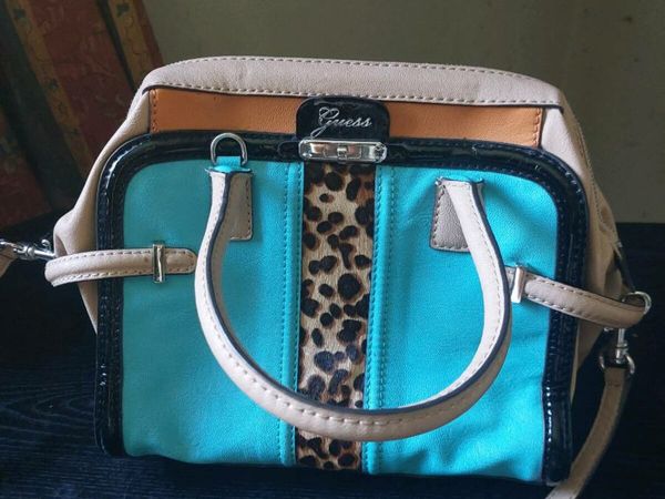 Turquoise handbags for online sale