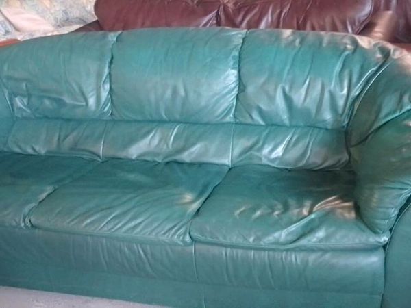 Teal green leather deals sofa