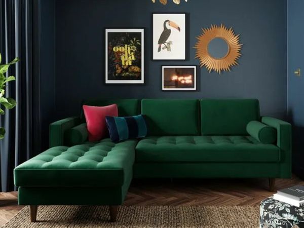 Second hand shop green sofa