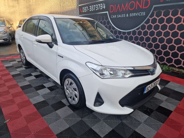 Toyota Corolla Saloon, Petrol Hybrid, 2018, White