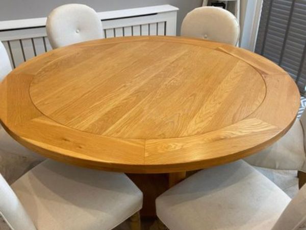 Dining table with cream deals leather chairs