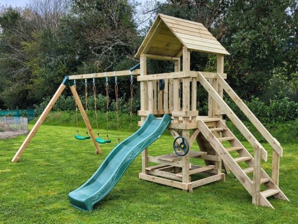 Swing set with tree house deals