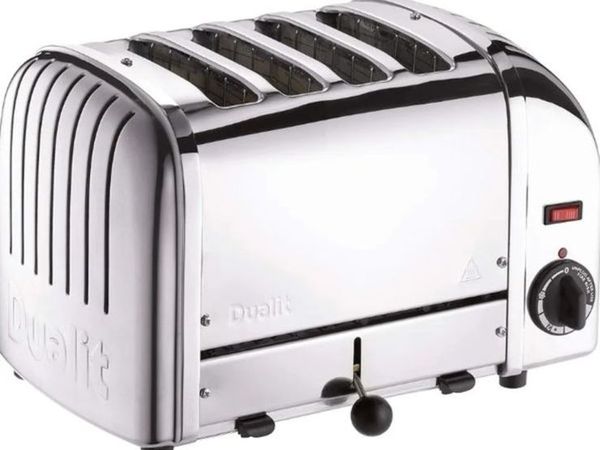 Brand New Dualit Classic 4 Slice Vario Toaster Stainless steel hand built in the UK Replaceable ProHeat elements Heat two or four slots defrost bread mechanical timer Replaceable