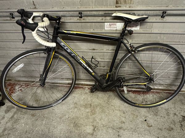 Carrera racing bike black and yellow sale