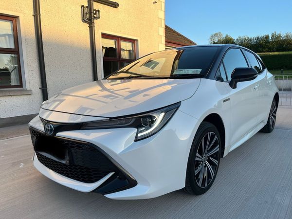 Toyota Corolla Hatchback, Petrol Hybrid, 2021, White