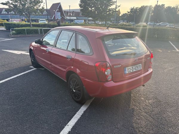 Mazda 323 Hatchback, Petrol, 2002, Red