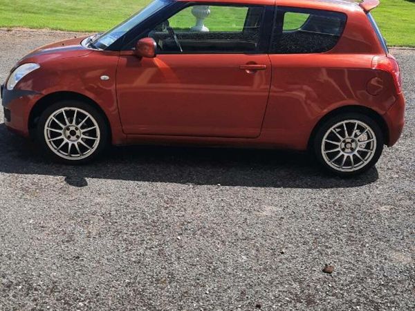 Suzuki Swift Hatchback, Petrol, 2009, Orange