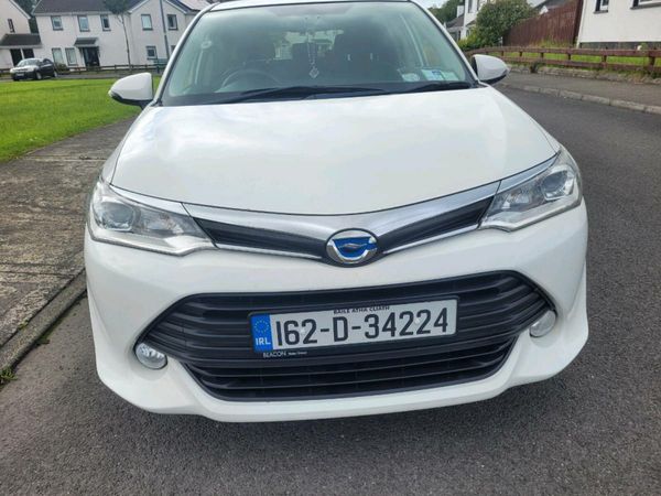 Toyota Corolla Estate, Petrol Hybrid, 2016, White