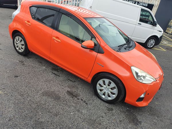 Toyota Aqua Hatchback, Petrol Hybrid, 2013, Orange