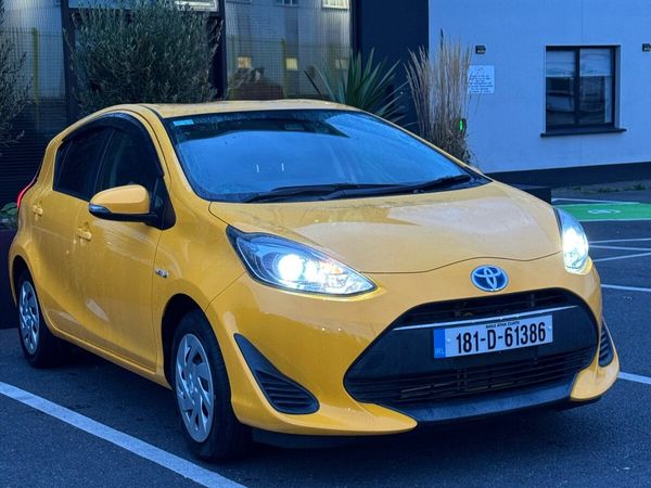Toyota Aqua Hatchback, Petrol Hybrid, 2018, Yellow