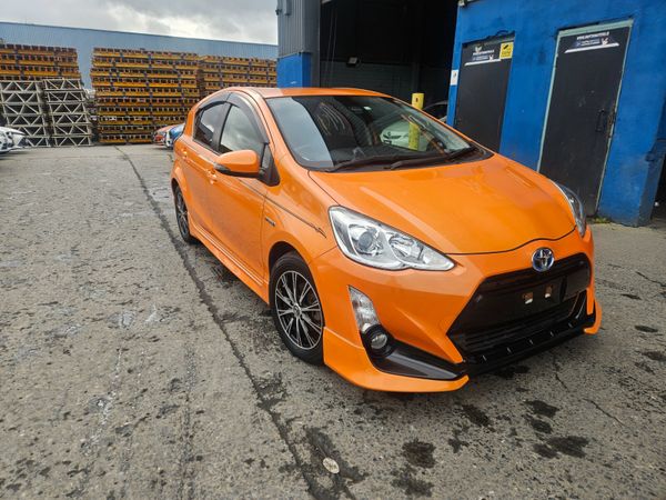 Toyota Aqua Hatchback, Petrol Hybrid, 2018, Orange