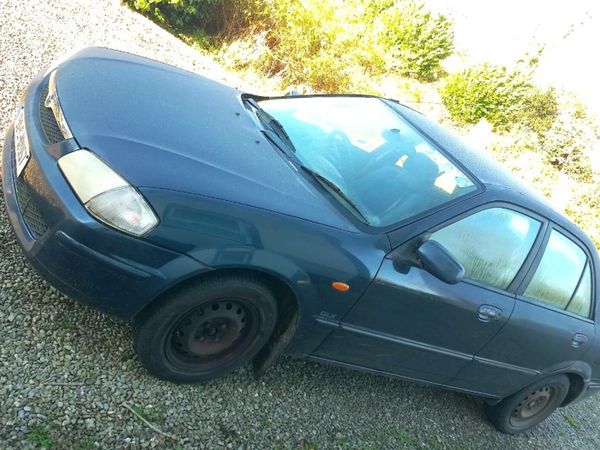 Mazda 323 Saloon, Petrol, 1999, Blue