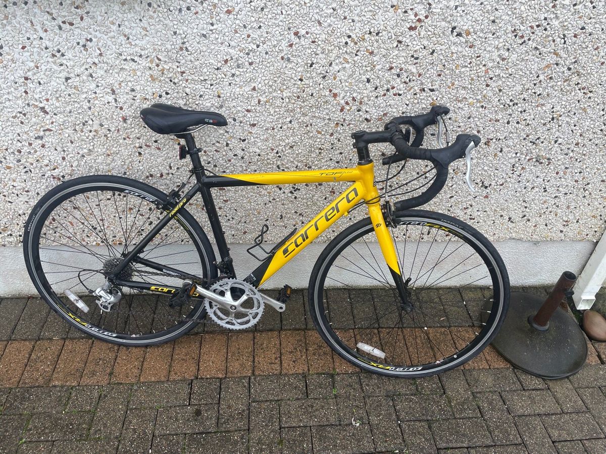 Carrera black and store yellow road bike