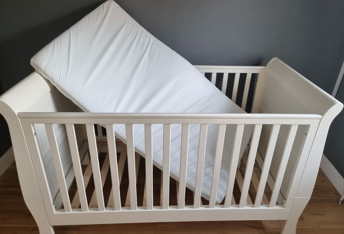 Mia sleigh cot clearance bed