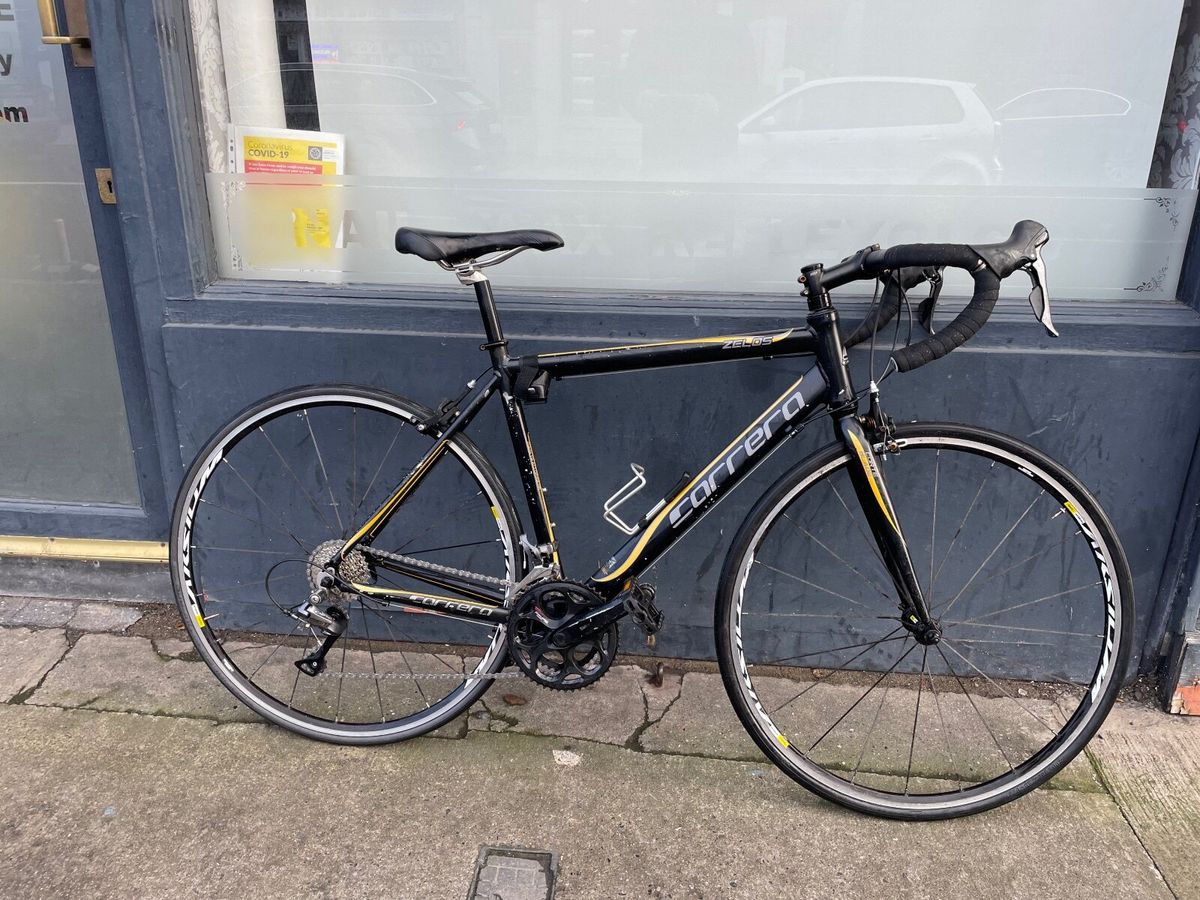 Carrera zelos road bike black store and yellow