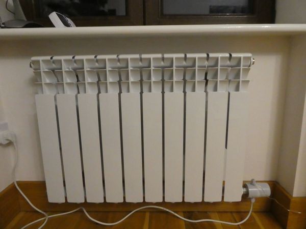 Oil or water filled aluminium radiator