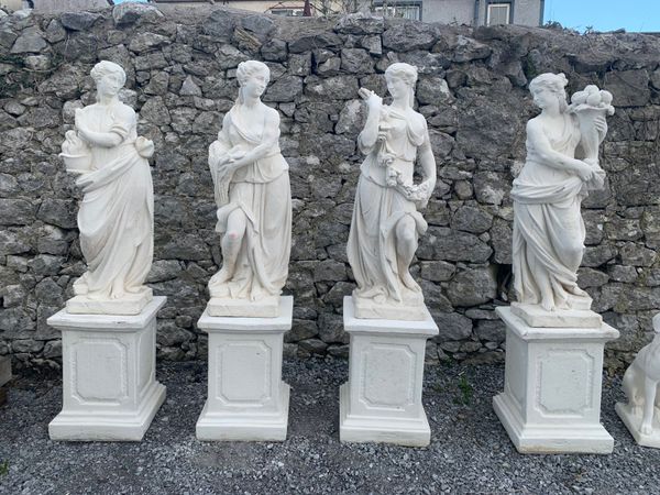 Set of four seasons statues on plinths