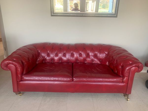 Red leather chesterfield with horsehair