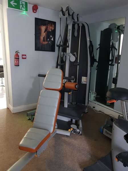 Gym equipment SportsArtA93 with incline bench And Weights .