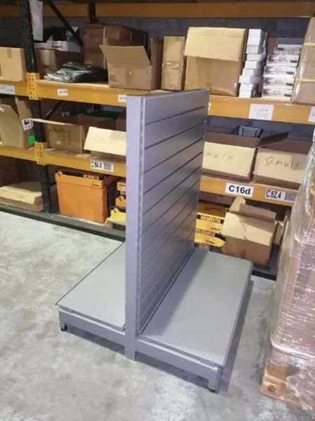Shop shelving with metal slatwall back