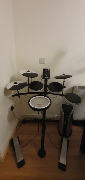 Roland TD-1K V-Drums with 8" meshhead snare plus a