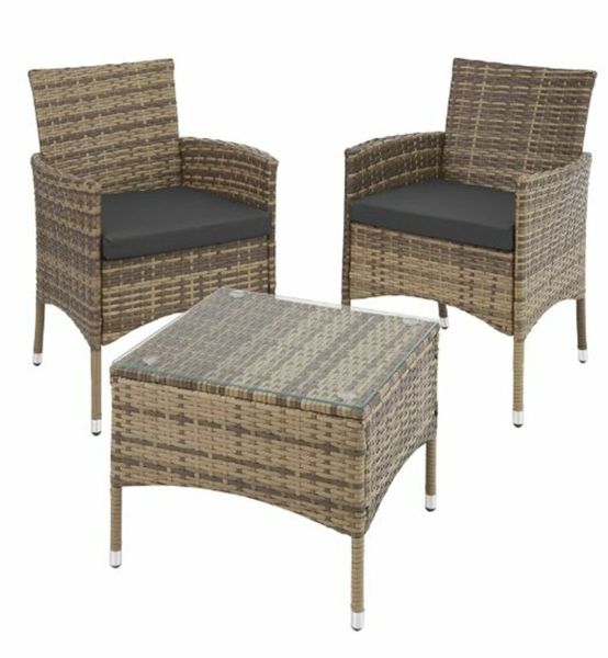 Small rattan table and 2 deals chairs