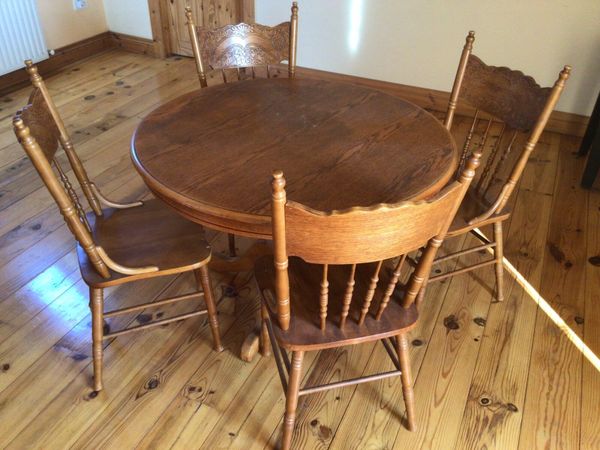 Wooden table and four chairs