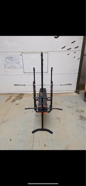 Fold away bench press weights bar for sale in Co. Dublin for 300