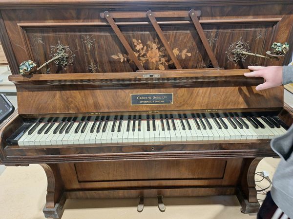 Selling store antique piano