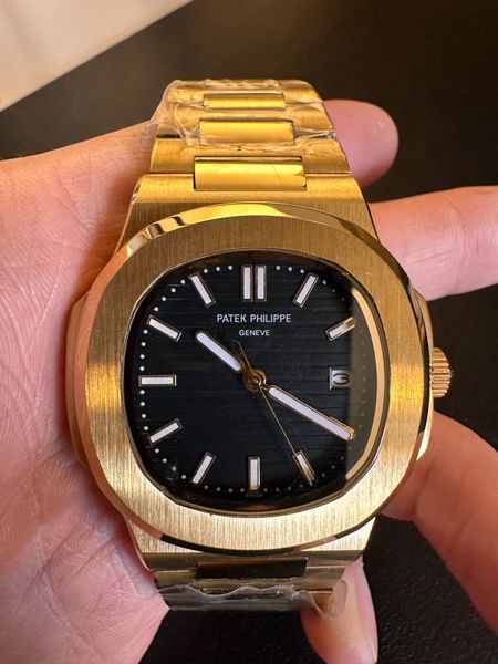 Patek philippe nautilus hot sale gold replica