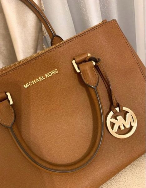 Michael kors red shop and brown handbag