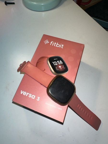 Fitbit ruby and hot sale rose gold