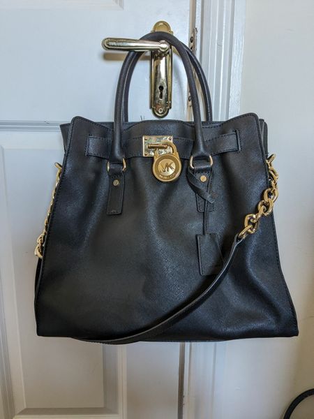 Michael kors black and hotsell grey handbag