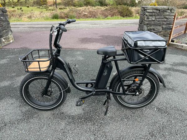 Blue bike with store basket