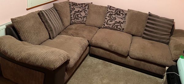 L shaped store tan couch