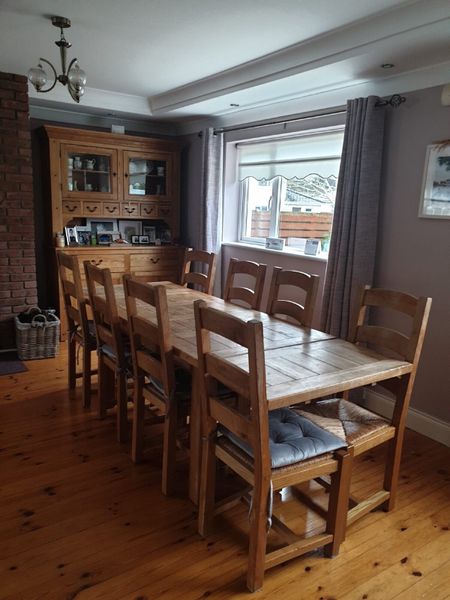 Solid oak table and deals 8 chairs