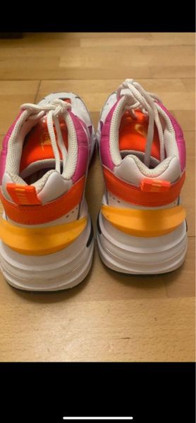 Ladies orange hot sale nike trainers