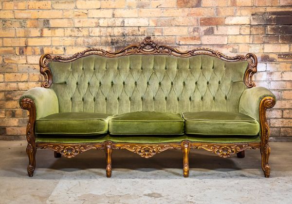 Vintage green store couch for sale