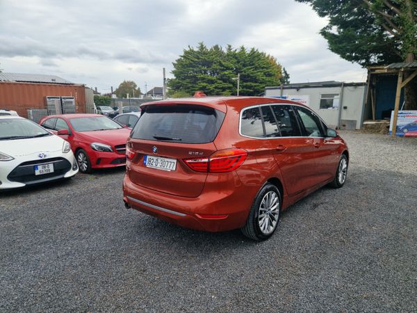 BMW 218D Gran Tourer 7 seater in Sunset Orange 368306512